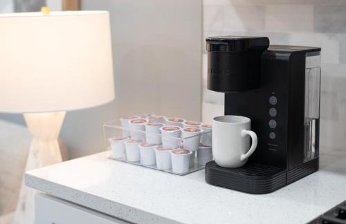 The Heights House | Modern Condo with Private Porch, Mins to NYC