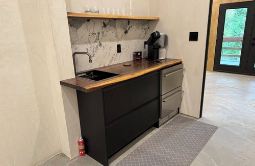 Champion Ski Chalet | Modern creekside chalet in Champion with private island minutes from 7 Springs