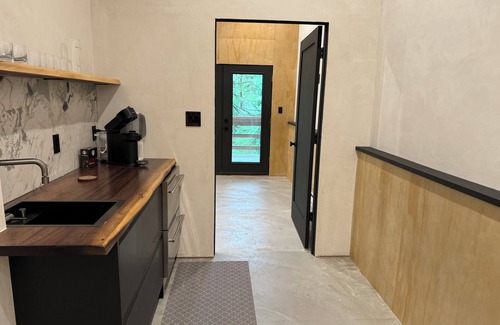 Champion Ski Chalet | Modern creekside chalet in Champion with private island minutes from 7 Springs