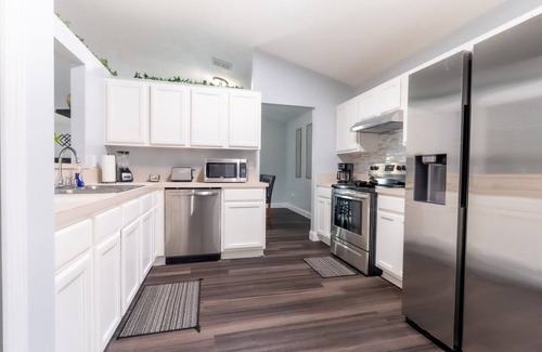 Oak Hill House | Modern Family Retreat w/Game Room and Fire Pit. Near NAS JAX