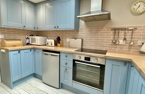 Treator House | Modern holiday home in Padstow Old Town with parking and patio garden