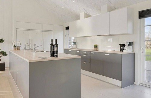 Frørup House | Modern holiday home with sea views and pool and activity room, WiFi and oven