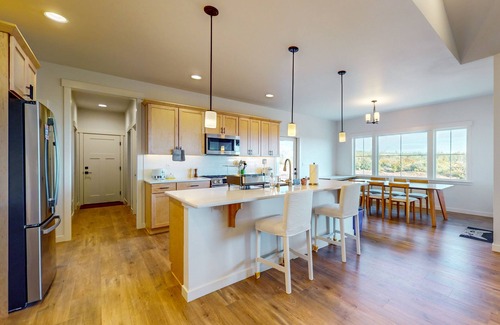 Union House | Modern home with fireplace, private patio, remote workspace, & golf nearby