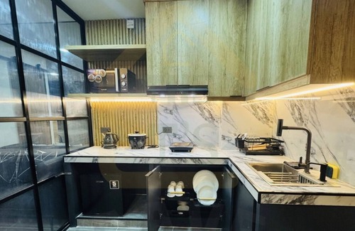 Caloocan Condo | Modern Industrial Condo near Fairview/North Caloocan with WiFi, AC, Netflix