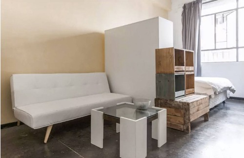 Downtown Johannesburg Apartment | Modern, Industrial-Style Studio Apartment in Cultural Neighbourhood