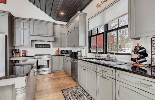 Spicer House | Modern Lake Home with game room and large patio in Spicer