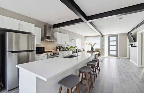 Central Alberta House | Modern Lakehouse and Guest home with Partial Lake View