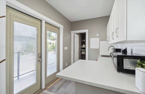 Central Alberta House | Modern Lakehouse and Guest home with Partial Lake View