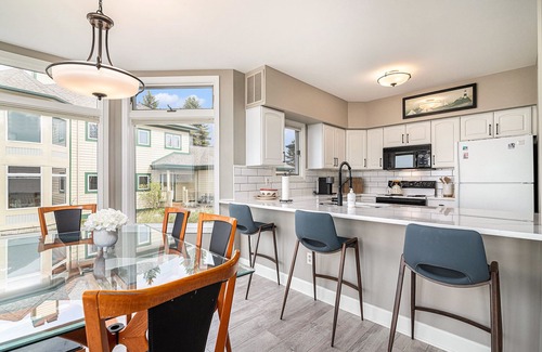 Manistee Condo | Modern Main Floor Waterfront Condo