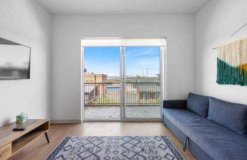 Downtown Louisville Apartment | Modern Nulu 2BR CozySuites 02