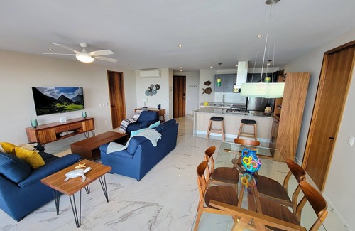 Bucerias Apartment | Modern penthouse with private terrace -18 unit bldg- 1/2 block from the beach.