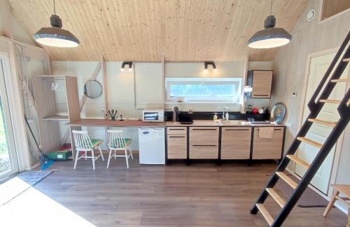 Telsiai Ski Chalet | Modern Sauna Cabin in Horse Ranch