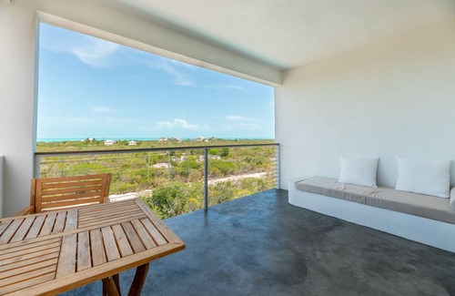 Long Bay Apartment | Modern Studio with Expansive Ocean View, Pool