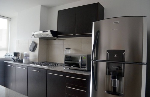 Quito Condo | MODERN SUITE IN AMAZIN AREA