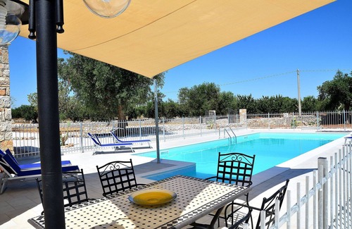 Castellana Grotte Villa | Modern trulli, 3 bedrooms, air conditioning, private swimming pool, pétanque court.