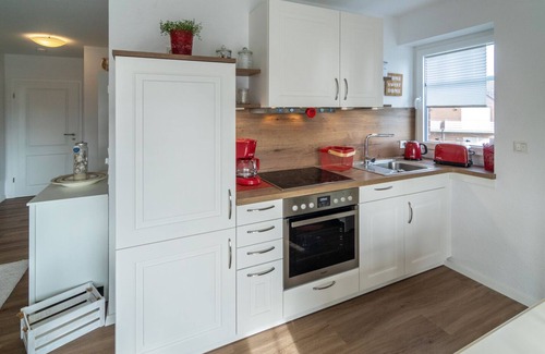 Westeraccumersiel Apartment | Modern upper apartment Meerglück with infrared cabin