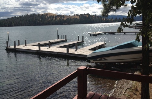 Proctor House | Moose Lodge Rustic Log Home Includes Two Boat Slip Dock with 2 guest cabins