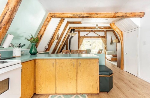 Hemlock Valley Cabin | Mountain side mid-century 70's A-frame with wood fire & hot tub