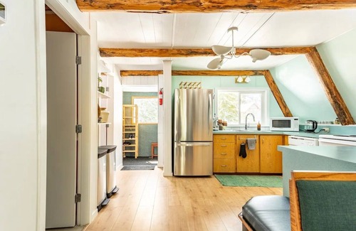 Hemlock Valley Cabin | Mountain side mid-century 70's A-frame with wood fire & hot tub