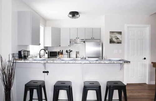 Harvie Heights Condo | Mountain View Family Getaway, Hot Tub, Park Pass