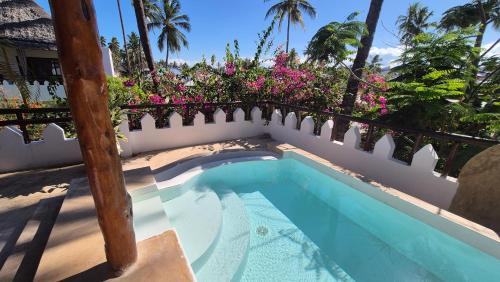 Pwani Mchangani Apartment | MOYO top floor apartment