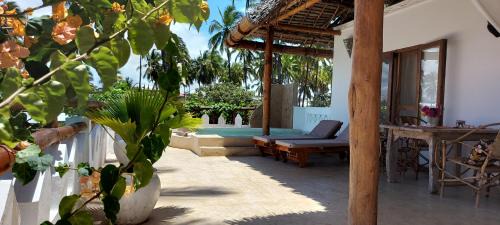 Pwani Mchangani Apartment | MOYO top floor apartment