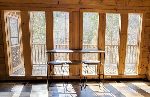 Townsend Cabin | Multi-level riverfront home w/water views, WiFi, game room, AC, private hot tub