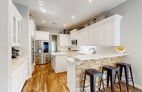 Montgomery House | Multiple level lake house with full kitchen, private patio, deck & water views