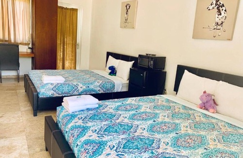 Manati House | MwPi 101 Pool Walk Out Suite / Manati World Point Inn