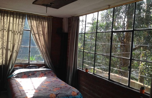 Banos de Agua Santa Bed & Breakfast | MYSTIC LODGE. Unique View.Unique Place.Unique Experience