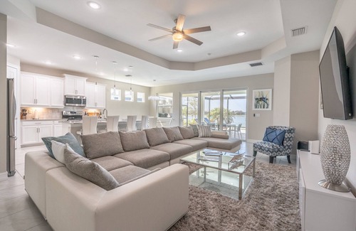 Naples House | 🌴 Naples Reserve Lakeview Escape | Lanai w/Pool & Hot Tub, Outdoor Kitchen, EV & Pet Friendly