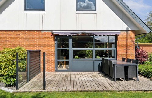 Hvalpsund Villa | Near beach and golf, with multi-purpose room.