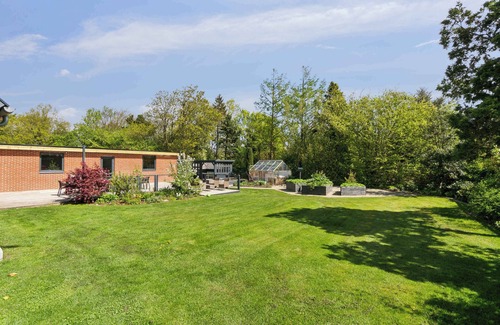 Hvalpsund Villa | Near beach and golf, with multi-purpose room.