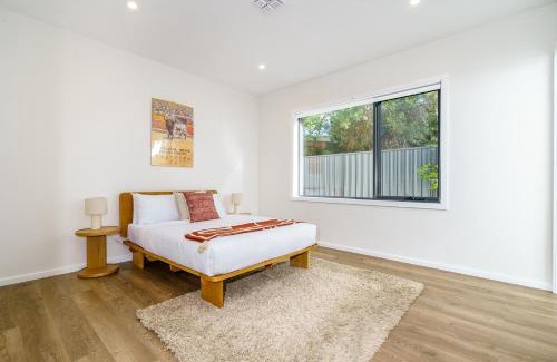 Ainslie House | New 4 bedroom city home with Tesla charger - Hosted by CanStay