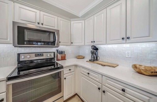 West Panama City Beach Condo | NEW Emerald Isle 2010 "Coastal Hippy Chic" Pool, FREE Tix&Beach Service for 4