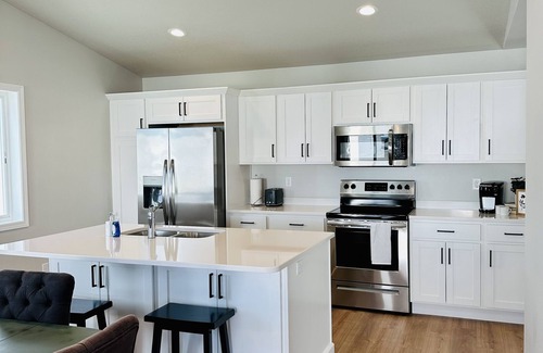 Fargo House | NEW family- friendly 3 bedrm home in West Fargo with space to gather and relax.