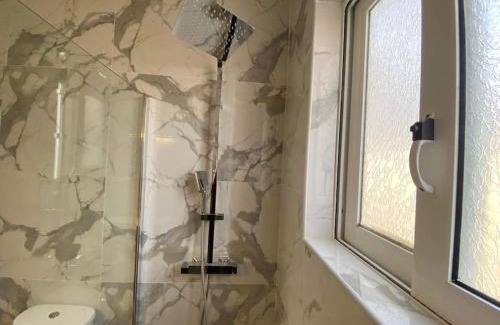 Lavreotiki Apartment | NEW! Flower Patio House 2 BDR - BBQ - Wash machine