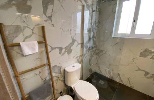 Lavreotiki Apartment | NEW! Flower Patio House 2 BDR - BBQ - Wash machine