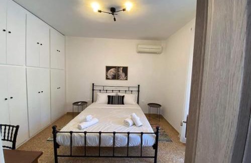 Lavreotiki Apartment | NEW! Flower Patio House 2 BDR - BBQ - Wash machine