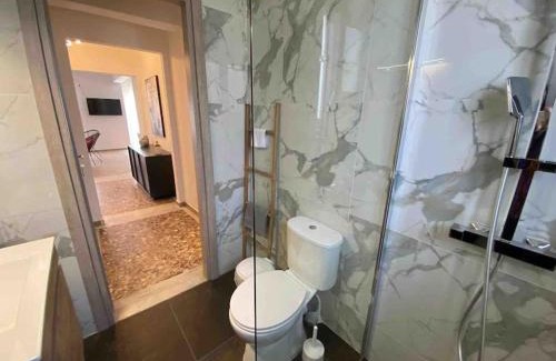 Lavreotiki Apartment | NEW! Flower Patio House 2 BDR - BBQ - Wash machine