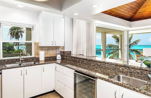 The Bight Condo | NEW LISTING: Pristine 2-Bedroom Oceanfront Penthouse Suite on Grace Bay Beach