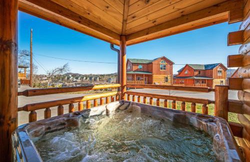 Pigeon Forge Ski Chalet | New Listing! Indoor Private Heated Pool, Less than 2 miles from Dollywood, Walk to Parkway, 4 Ensuite Bedrooms Sleeps 14, Dog Friendly, Game Room with TV, Arcade and Foosball, Hot Tub, BBQ, Smart TV and Wifi, Fully Loaded Kitchen, Washer and Dryer