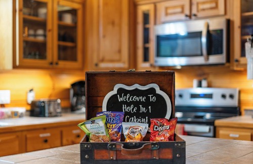 Sevierville Cabin | New Listing! MINI GOLF! 2BR/2BA Cabin w/HT, Fire Pit, Dog Run & Game Room!