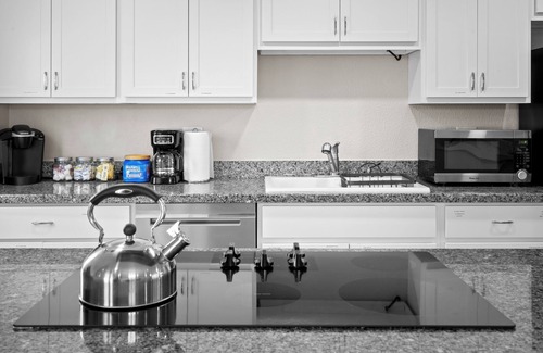 Cox Heights House | NEW Luxe Yard w/Putt Putt, TV, Fireplace & BBQ! Hot Tub & Heated Pool!