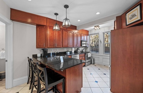 Salem Apartment | NEW Spacious 1BR on Salem Common l Steps to Downtown l Fenced in Yard + Parking