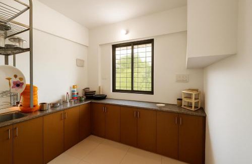 Tirupati Apartment | New Spacious 2BHK apartments in Tirupati Near Railway Station with fully equipped kitchen, AC bedrooms, Washing Machine, 24 hours water, caretaker service, and ample space for car parking & ideal for families and pilgrims