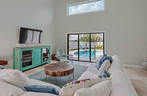 Juno Beach House | NEW! Walk to the Beach Juno Beauty w/ Pool & Bikes