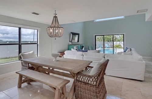 Juno Beach House | NEW! Walk to the Beach Juno Beauty w/ Pool & Bikes