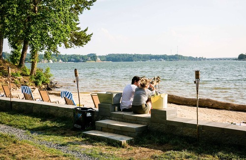Steele Creek Cabin | New Waterfront Cabin on the Large Sundeck #24 by RedAwning