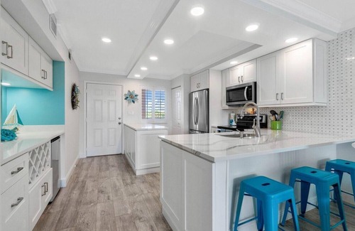 Jupiter Bay Condo | Newly Available Jupiter Bay Condo 3rd Floor Views of Ponds hosted by A&E Hosts!